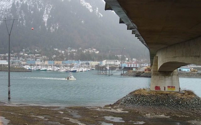 Downtown Juneau and its mountains seen from beneath the bridge to Douglas Island